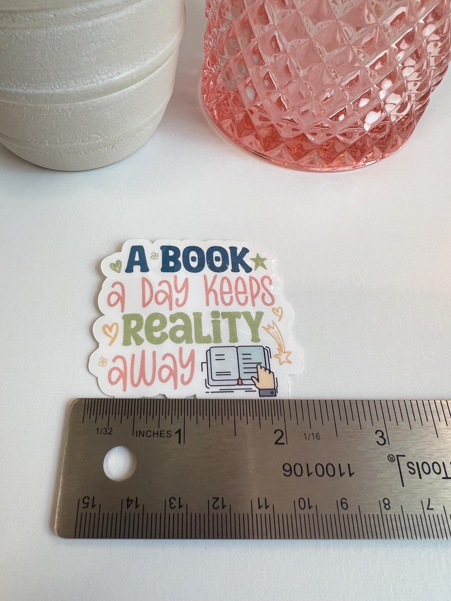 A Book a Day Keeps Reality Away sticker -water-resistant, water bottles, laptop, kindle, mug