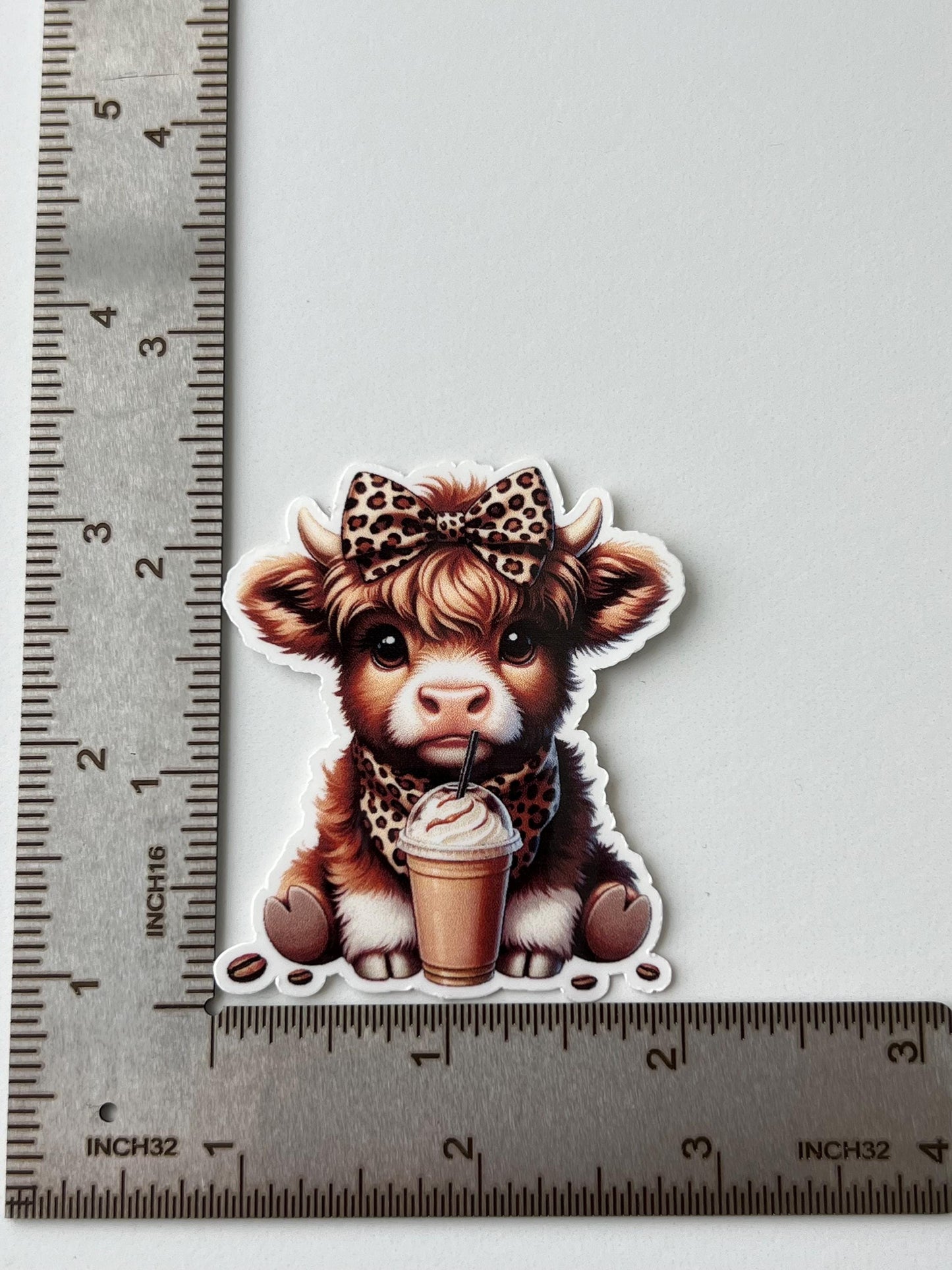 Highland cow with coffee sticker - water-resistant, water bottles, laptop, kindle, mug