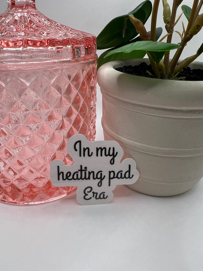 In my heating pad Era - water-resistant, water bottles, laptop, kindle, mug, chronic illness