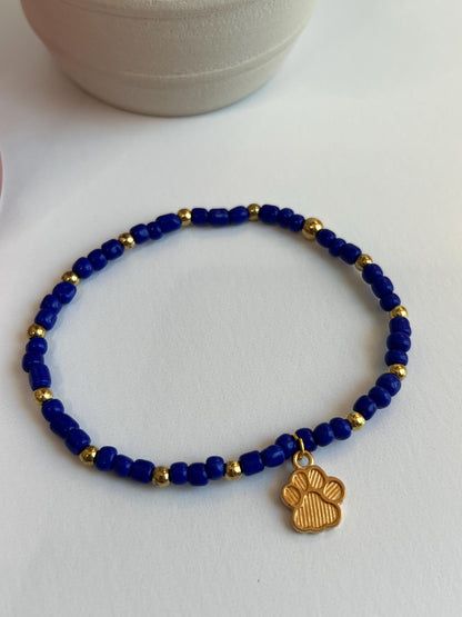 Handmade Beaded Bracelet: Royal Blue, Gold Paw Print Charm