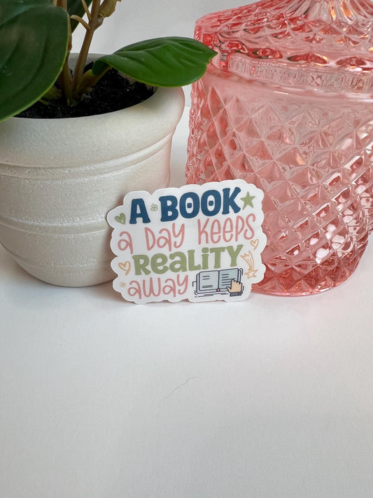 A Book a Day Keeps Reality Away sticker -water-resistant, water bottles, laptop, kindle, mug